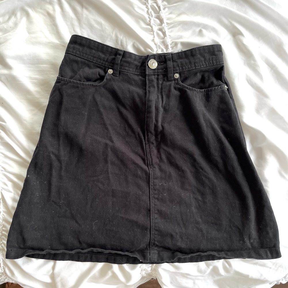 H&M Divided mini skirt black with pockets, button and zip closure, size 0